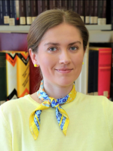 Abbildung von Podiumsdiskussionsteilnehmerin Kateryna Busol. Eine Frau in Porträtansicht ist zu sehen.